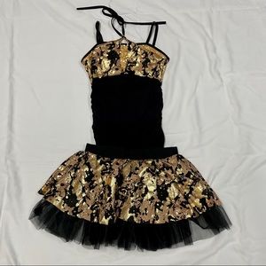 Lightly used gold and black dance costume in size adult small.